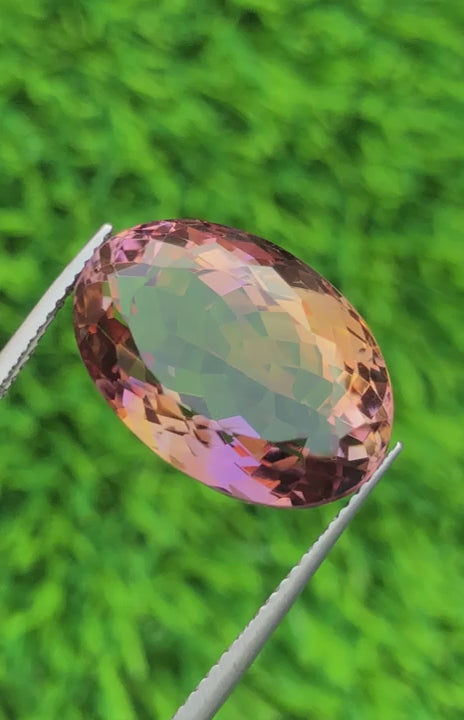 Natural Ametrine 18.40 carats, fancy oval cut, purple-yellow bi-color gemstone from Bolivia, untreated