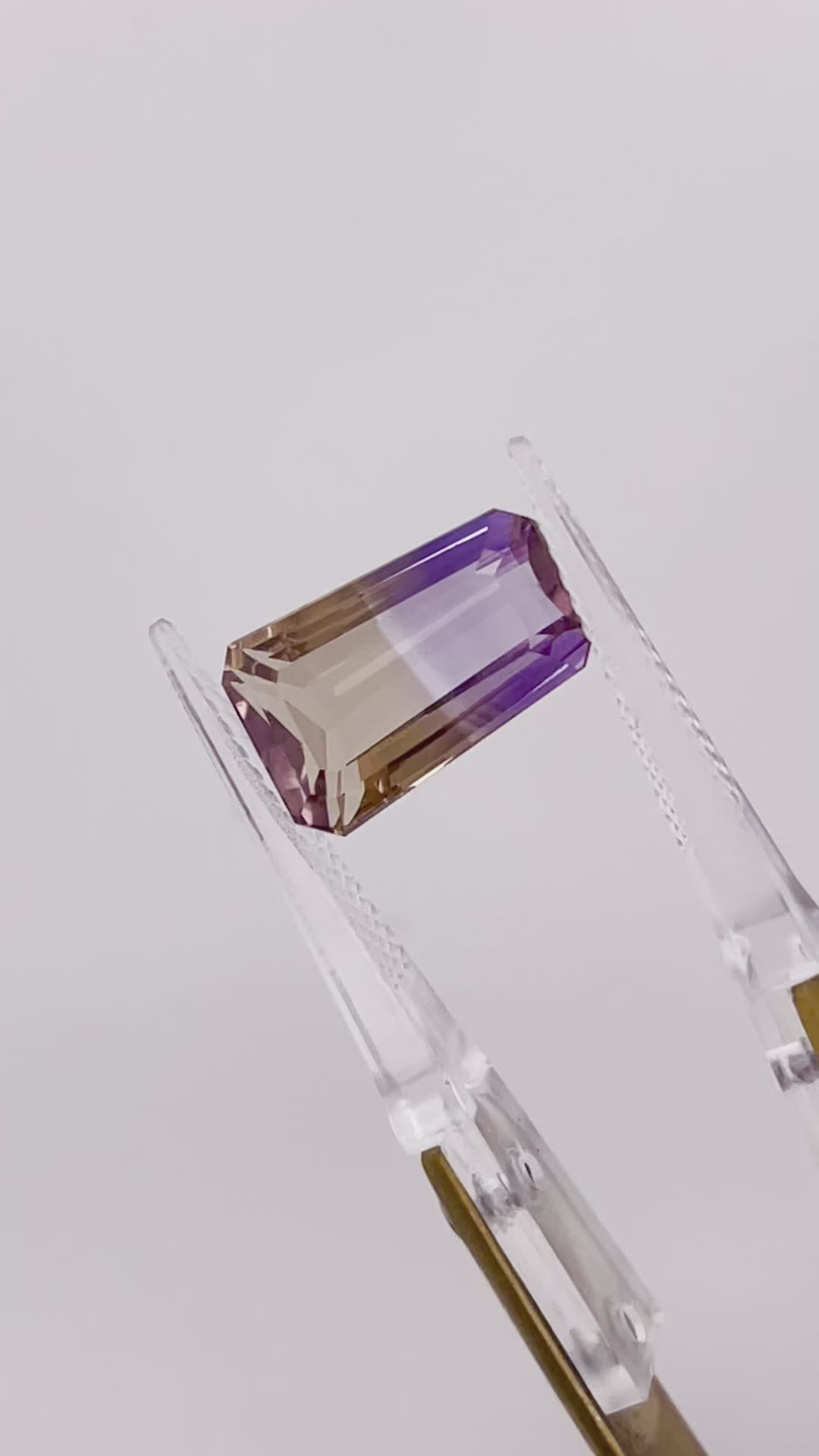 Natural Ametrine 7.03 carats, tapered baguette cut, flawless purple-yellow bi-color gemstone, untreated