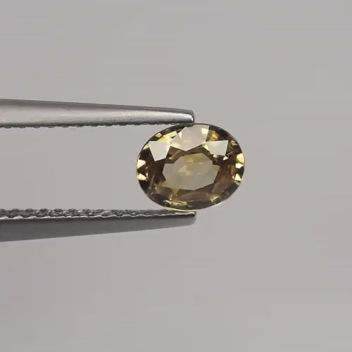 Natural honey yellow zircon, 1.08 carats, oval cut, VS clarity, untreated