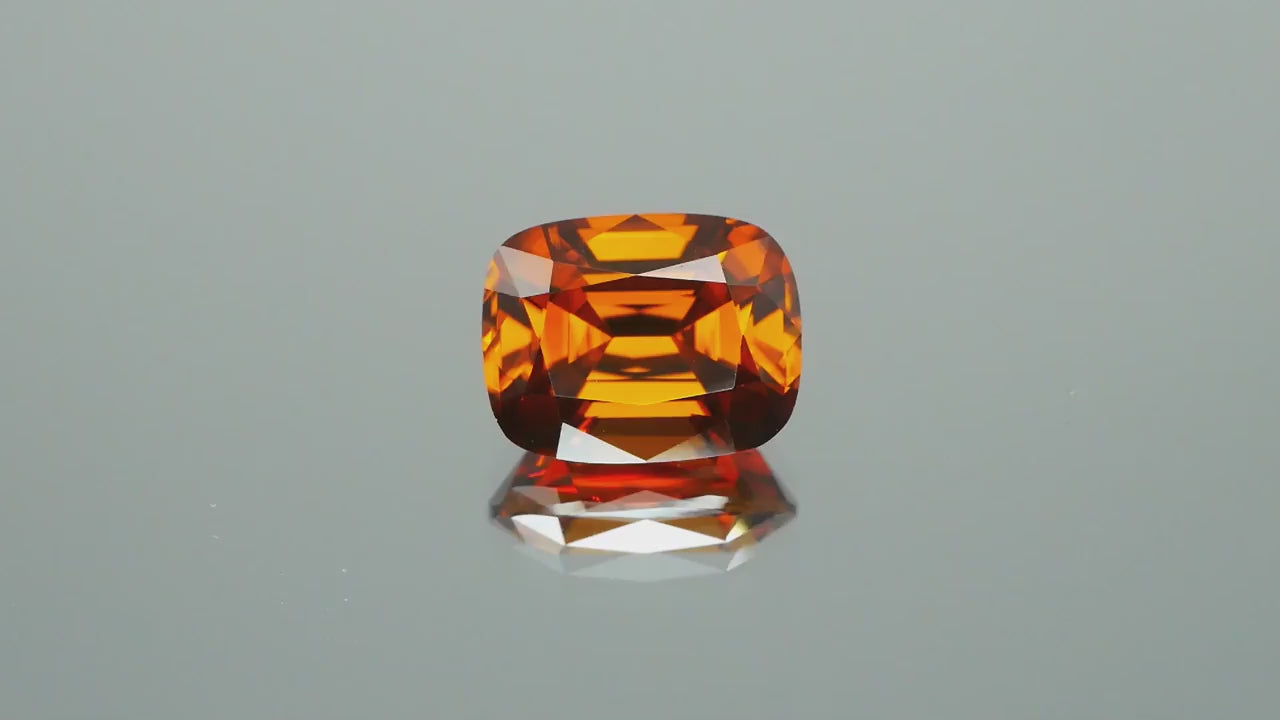Natural whiskey honey brown zircon, 3.79 carats, cushion cut, VVS clarity, untreated, from Madagascar