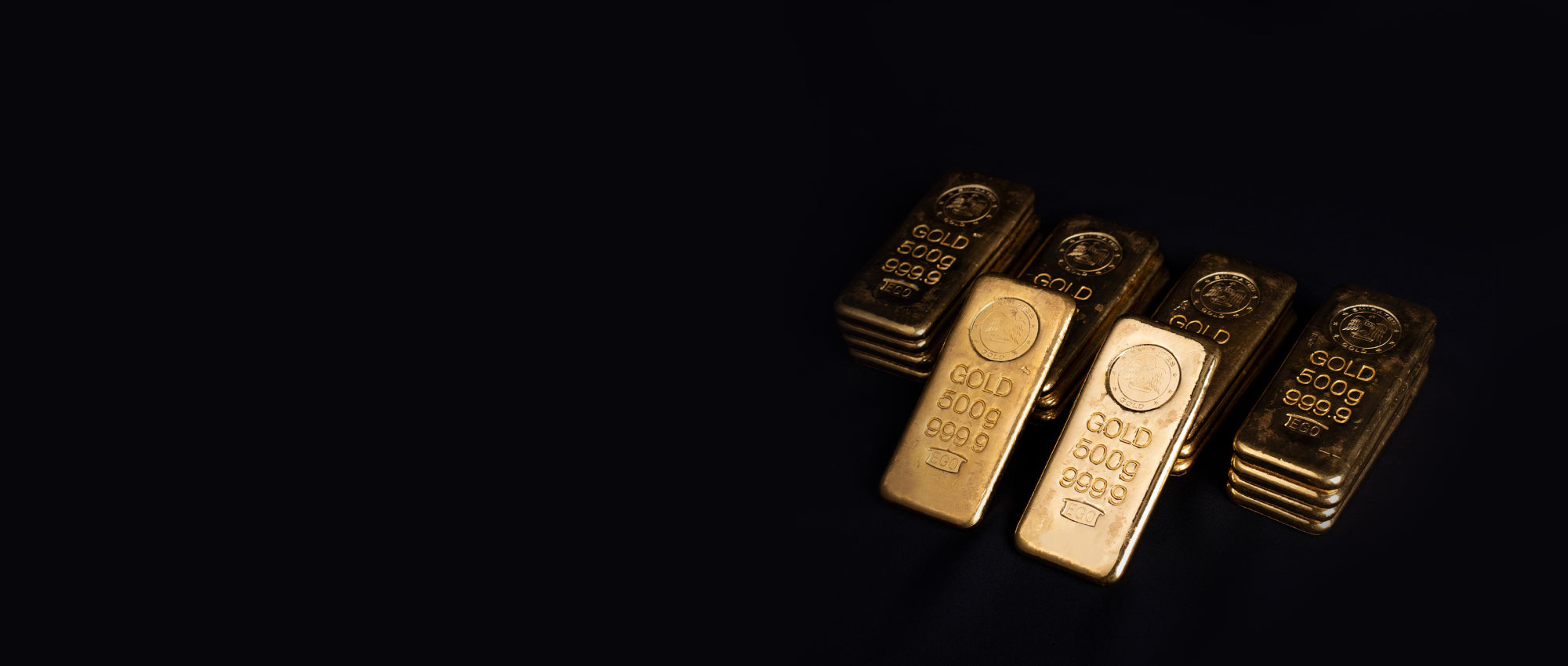 Gold bars on black background